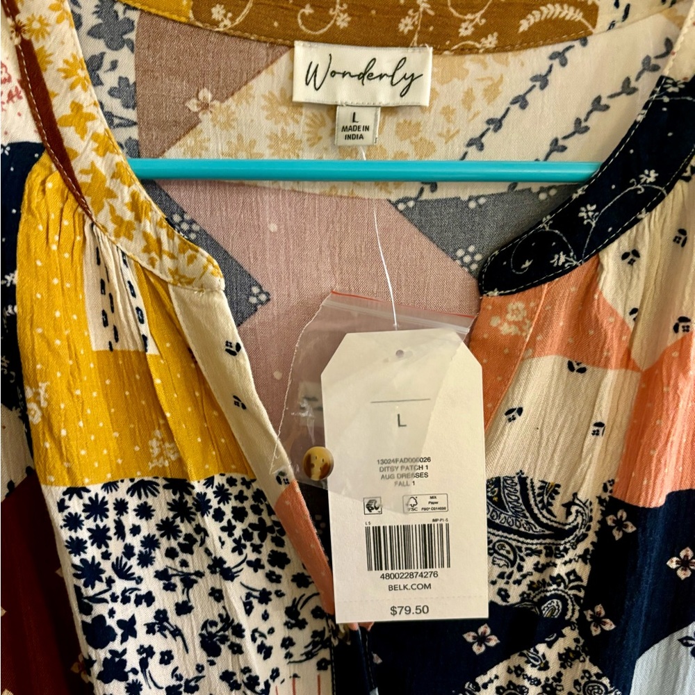 Wonderly eccentric patchwork print maxi dress. Button closure.